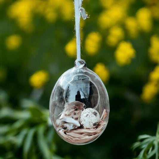 Vackert glashängande med fågel och ägg