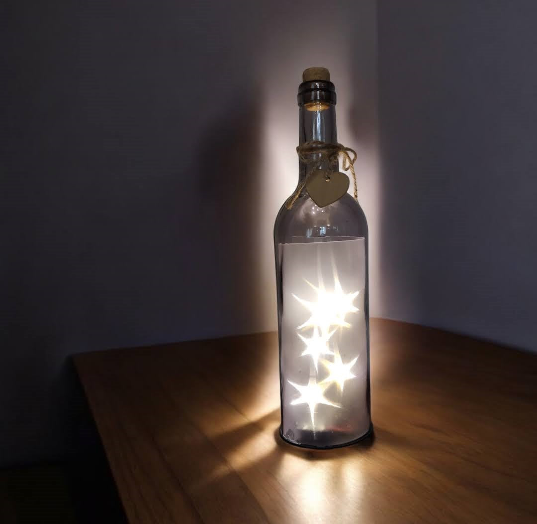 Flaska med ljusslingor inuti