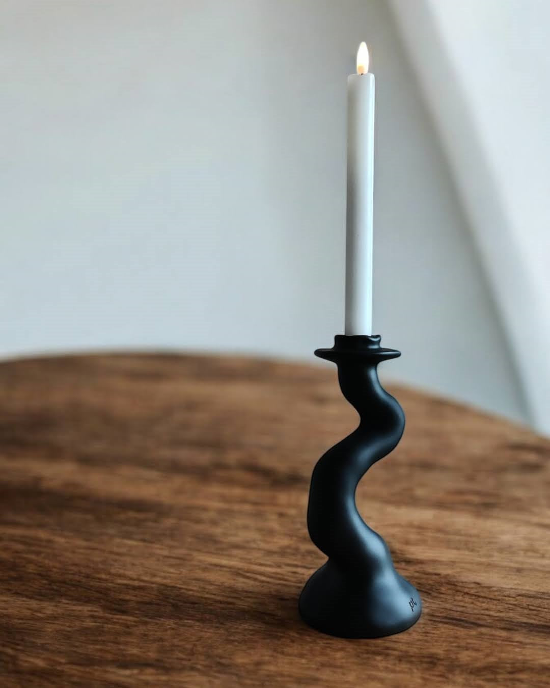 Ljusstake med gunga