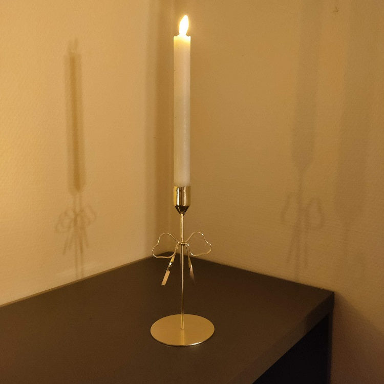 Ljusstake med rosett