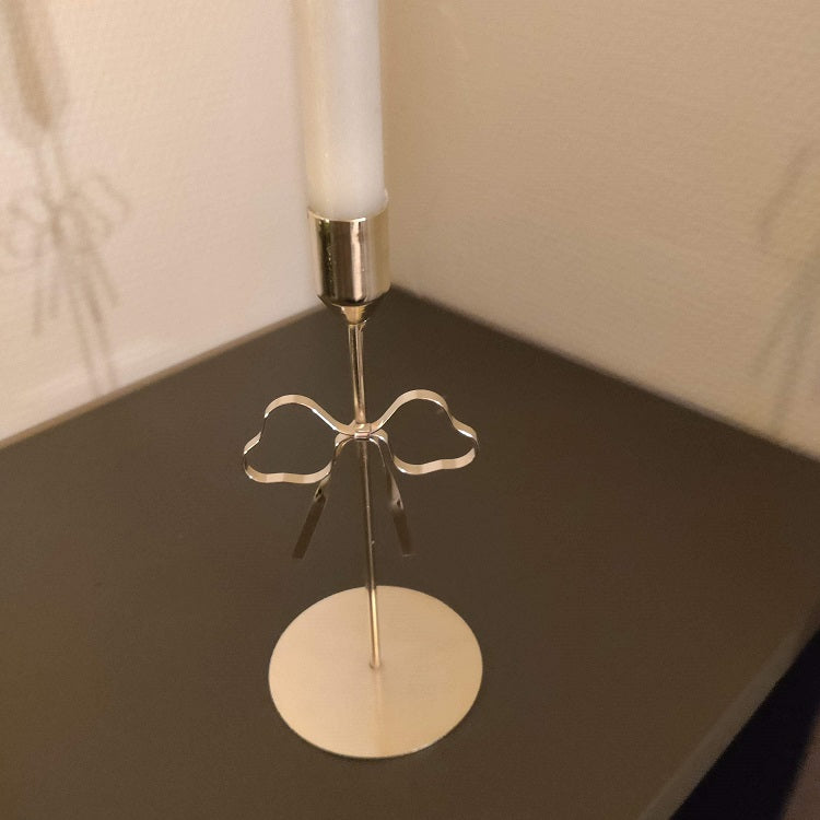 Ljusstake med rosett